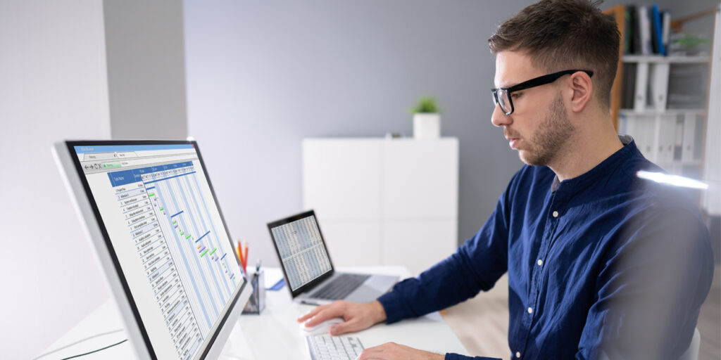 Cybersecurity is important to the young professional working on his computer